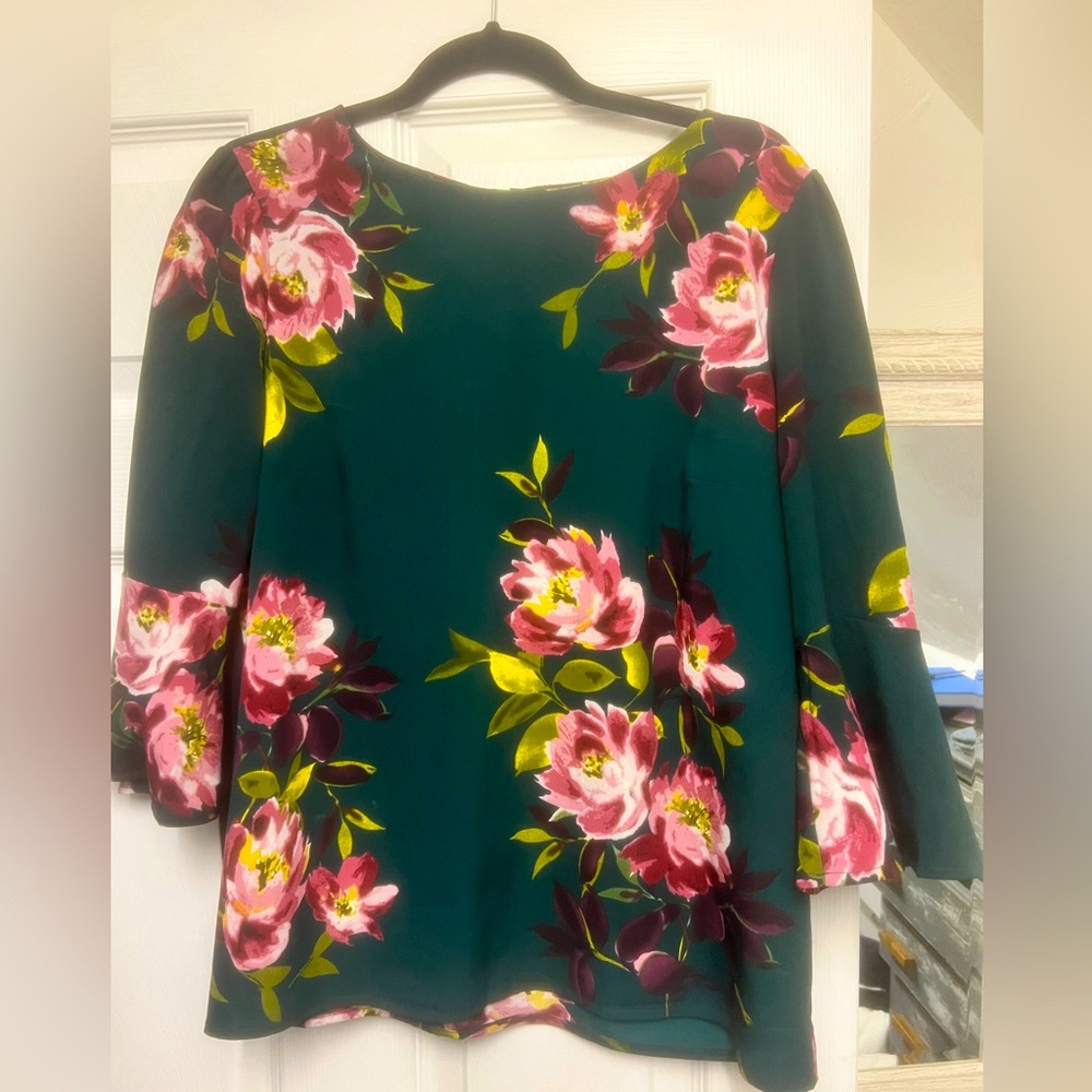 Women’s blouse size large.